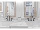 Stylish bathroom featuring double sinks with marble countertop and modern fixtures at 18009 Kings Point Dr # C, Cornelius, NC 28031