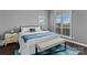 Bright bedroom with natural light, neutral colors, and comfortable furnishings at 18009 Kings Point Dr # C, Cornelius, NC 28031