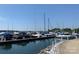 View of a harbor featuring sailboats and powerboats docked on a sunny day at 18009 Kings Point Dr # C, Cornelius, NC 28031