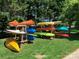 Organized kayak storage area with multiple colorful kayaks, showcasing outdoor amenities at 18009 Kings Point Dr # C, Cornelius, NC 28031