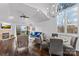 Bright living room with hardwood floors, fireplace, and water views at 18009 Kings Point Dr # C, Cornelius, NC 28031