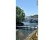 Scenic marina view featuring boats, pier, and calm waters on a clear day at 18009 Kings Point Dr # C, Cornelius, NC 28031