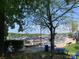 Scenic view of the marina showcasing boat docks, landscaping, and nearby trees at 18009 Kings Point Dr # C, Cornelius, NC 28031
