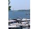 Scenic view of the lake and marina, showcasing the beautiful waterfront community at 18009 Kings Point Dr # C, Cornelius, NC 28031