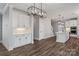 Open kitchen layout featuring an island, white cabinets, and stainless steel appliances at 2092 Fordhill St, Rock Hill, SC 29732
