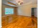 Bright bedroom with hardwood floors, tray ceiling and natural light at 229 River Birch Dr, Salisbury, NC 28146