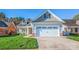Charming home with a well-maintained lawn and an attached two-car garage at 229 River Birch Dr, Salisbury, NC 28146