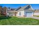 Charming home with a well-maintained lawn, inviting front porch, and attached two-car garage at 229 River Birch Dr, Salisbury, NC 28146