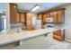 This kitchen offers light wood cabinetry, stainless appliances, and a breakfast bar at 229 River Birch Dr, Salisbury, NC 28146