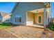 A charming brick patio off the back of the house is ideal for relaxing outside at 229 River Birch Dr, Salisbury, NC 28146