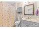 Bathroom featuring a vanity, toilet, and a shower with a decorative curtain at 2341 Shannon Dr, Belmont, NC 28012