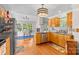 Updated kitchen with stainless steel appliances, light wood cabinets, and an adjacent dining area at 2341 Shannon Dr, Belmont, NC 28012