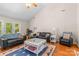 Open living room with vaulted ceilings, modern decor, and access to the outdoors at 2341 Shannon Dr, Belmont, NC 28012
