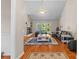Well-decorated living area with hardwood floors, a fireplace, and French doors to the patio at 2341 Shannon Dr, Belmont, NC 28012