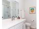 Neat bathroom featuring a framed mirror, modern fixtures, and a shower with glass door at 2342 Wesley Landing Rd, Waxhaw, NC 28173