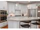 Gourmet kitchen with a center island, stainless appliances, and a built-in oven at 2342 Wesley Landing Rd, Waxhaw, NC 28173