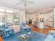 Bright living room with hardwood floors, a large window, and views of the kitchen at 2342 Wesley Landing Rd, Waxhaw, NC 28173