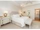Serene main bedroom with a tray ceiling, neutral decor, and an ensuite bathroom at 2342 Wesley Landing Rd, Waxhaw, NC 28173