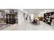 Finished basement area featuring a dining table, sliding barn door, and unique decor at 2482 Kings Grant Rd, Lincolnton, NC 28092