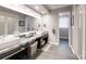 Contemporary bathroom with double sink vanity, and decorative tiled wall accents, and large shower with glass enclosure at 2482 Kings Grant Rd, Lincolnton, NC 28092