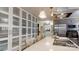 A modern kitchen featuring white cabinets, a center island with bar stools, and stainless appliances at 2482 Kings Grant Rd, Lincolnton, NC 28092