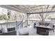 Comfortable patio with furniture, overhead covering and view of the yard at 2482 Kings Grant Rd, Lincolnton, NC 28092