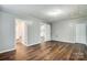 Open basement area with wood-style floors, with plenty of potential at 26 Park Dr, Gastonia, NC 28054