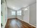 Bright entryway with wood-look floors, a neutral color scheme, and ample natural light at 26 Park Dr, Gastonia, NC 28054