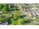 Overview of a quiet neighborhood with tree-lined streets and well-maintained homes at 26 Park Dr, Gastonia, NC 28054