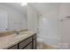Bathroom featuring granite vanity, ceramic flooring, and shower-tub combo at 276 Annatto Way, Tega Cay, SC 29708
