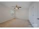 Simple bedroom featuring neutral walls, carpet floors and natural light at 276 Annatto Way, Tega Cay, SC 29708