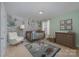 Charming Bedroom with jungle-themed wallpaper, crib, and bright decor at 276 Annatto Way, Tega Cay, SC 29708
