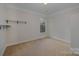Neutral bedroom with carpet, a window for natural light, and space for personalization at 276 Annatto Way, Tega Cay, SC 29708