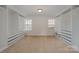 Spacious walk-in closet with custom shelving and drawers offers ample storage at 276 Annatto Way, Tega Cay, SC 29708
