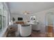 Bright and airy living room with modern furniture and hardwood floors, perfect for entertaining and relaxing at 276 Annatto Way, Tega Cay, SC 29708