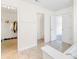 Open bathroom design with easy access to the walk-in closet and adjoining rooms at 3124 Berry Creek Rd, Charlotte, NC 28214