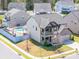 Beautiful two-story home with a pool, balcony and a well-manicured lawn in a desirable neighborhood at 3124 Berry Creek Rd, Charlotte, NC 28214