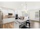 Modern kitchen features granite countertops, stainless steel appliances, and breakfast bar at 3124 Berry Creek Rd, Charlotte, NC 28214