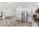 Bright kitchen with granite countertops, stainless steel appliances, and ample cabinet space at 3124 Berry Creek Rd, Charlotte, NC 28214