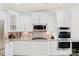 Gourmet kitchen boasts stainless steel appliances and stylish backsplash at 3124 Berry Creek Rd, Charlotte, NC 28214