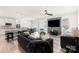 Spacious living area with an open floor plan, connecting the kitchen, dining, and living spaces at 3124 Berry Creek Rd, Charlotte, NC 28214