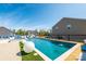 Stunning pool area with spa, lounge chairs and well-maintained landscaping perfect for relaxation at 3124 Berry Creek Rd, Charlotte, NC 28214