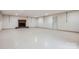 Spacious basement with a brick fireplace and ample room for activities at 3225 Liberty Rd, Gold Hill, NC 28071