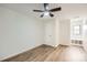 Bright bedroom with ample closet space, window, and ceiling fan at 3225 Liberty Rd, Gold Hill, NC 28071