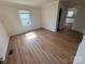 Bedroom with bright, natural light, neutral walls, and wood-look flooring at 325 Orr Dr, Rock Hill, SC 29730