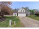Charming two-story home features a well-maintained lawn and an attached two-car garage at 3904 Crimson Wing Dr, Indian Trail, NC 28079