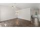 Open living room featuring vaulted ceiling, neutral paint and modern ceiling fan at 3904 Crimson Wing Dr, Indian Trail, NC 28079