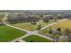 An aerial view of a modern farmhouse-style home at the intersection of New Salem Rd. and E. Lawlers Rd at 3907 E Lawyers Rd, Monroe, NC 28110