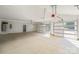 Spacious three car garage with ample room for vehicles and storage at 3907 E Lawyers Rd, Monroe, NC 28110