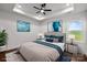 Staged main bedroom featuring stylish decor, a comfortable bed, and bright natural light at 3907 E Lawyers Rd, Monroe, NC 28110